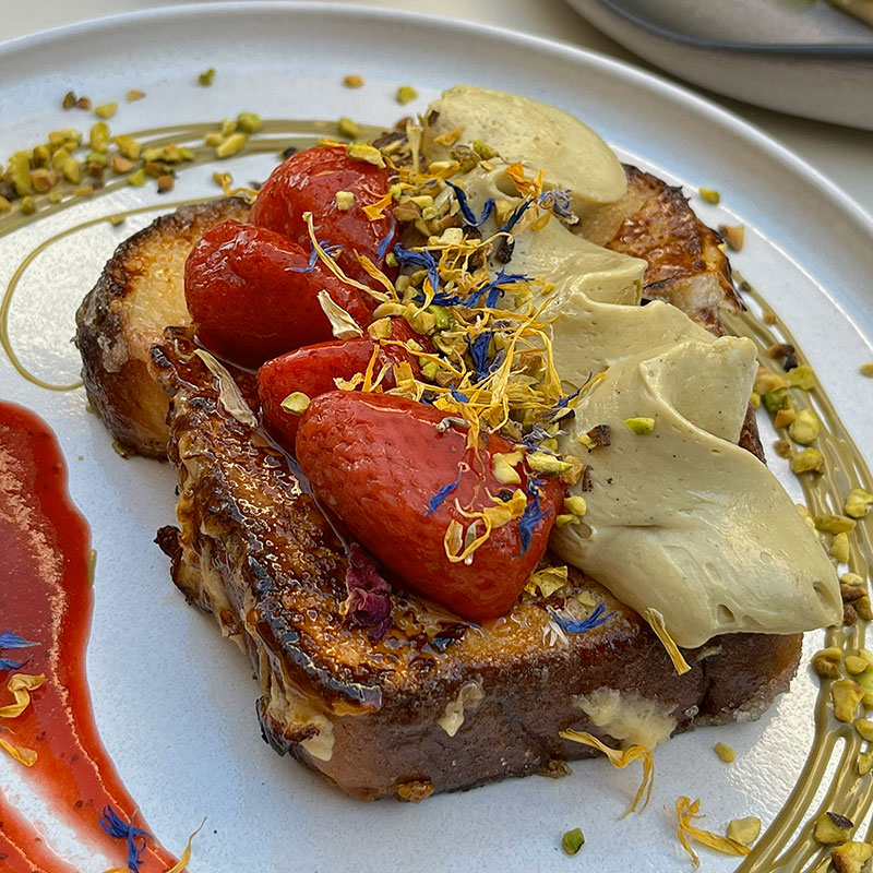 Pistachio French toast brunch dish in Budapest at Pink Pistachio Brunch