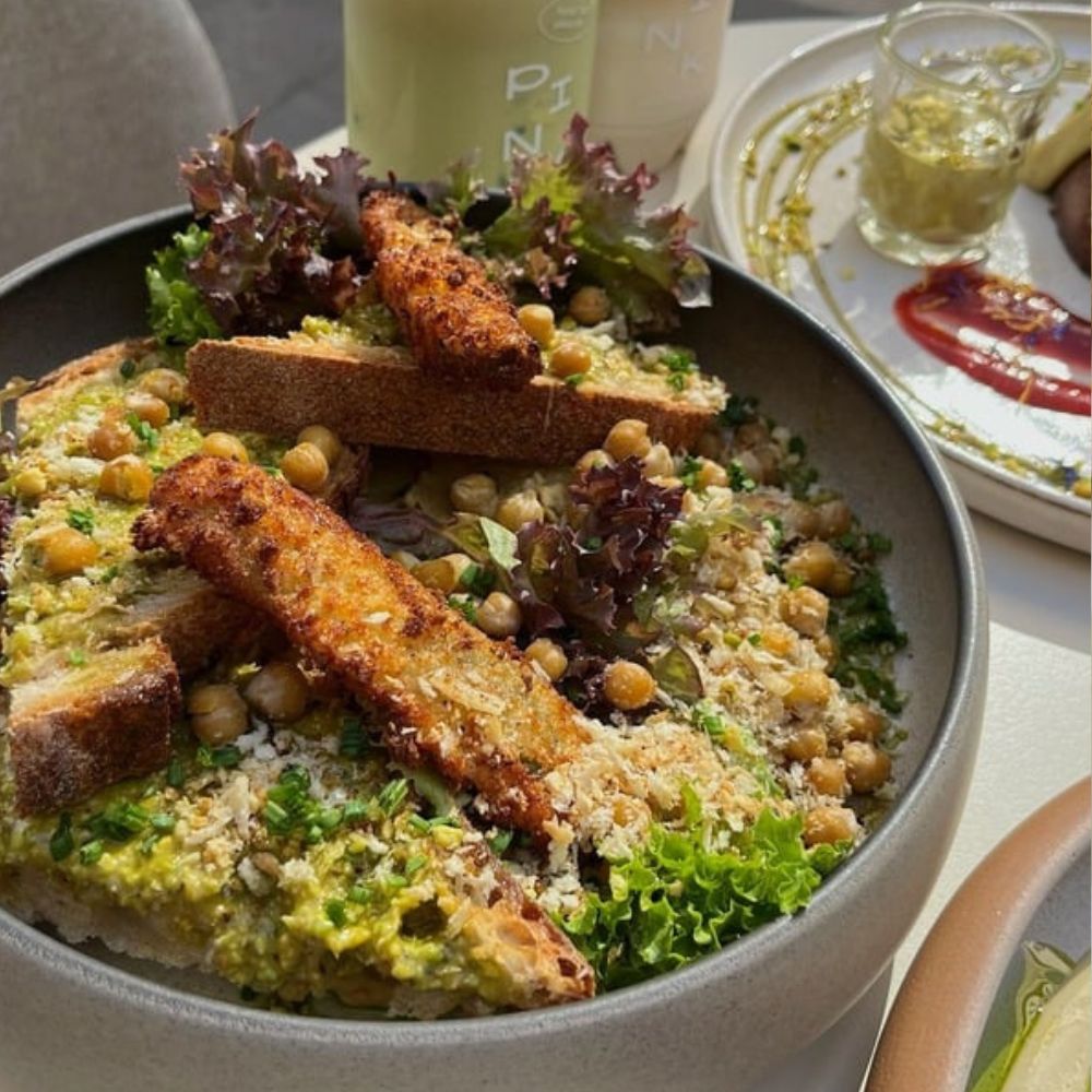 Brunch Budapest pistachio hummus at Pink Pistachio Brunch served with sourdough bread